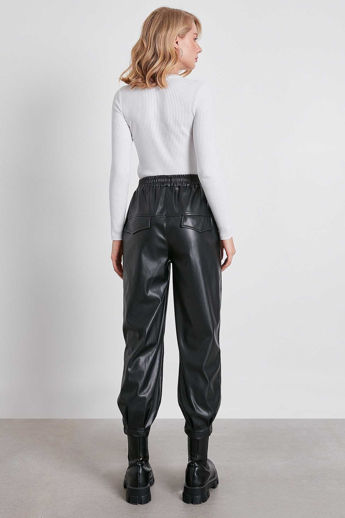 FAUX LEATHER TROUSERS WITH ELASTANE WAIST