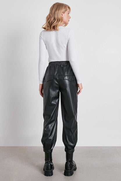 FAUX LEATHER TROUSERS WITH ELASTANE WAIST