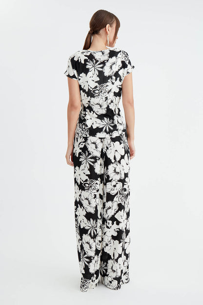 LOOSE TROUSERS WITH FLOWER PRINTS