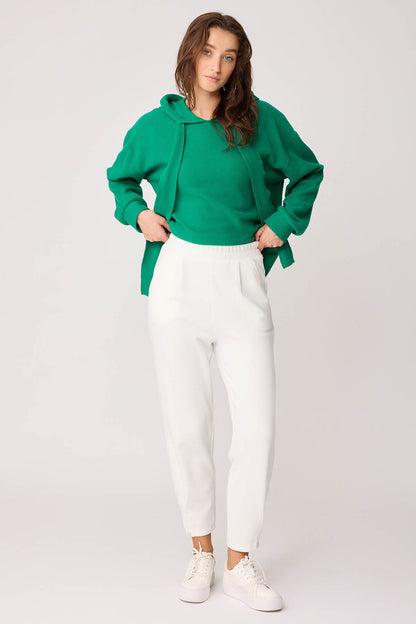 KNITTED TROUSERS WITH CUTOUT BUTTONS