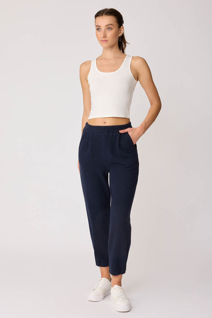KNITTED TROUSERS WITH CUTOUT BUTTONS