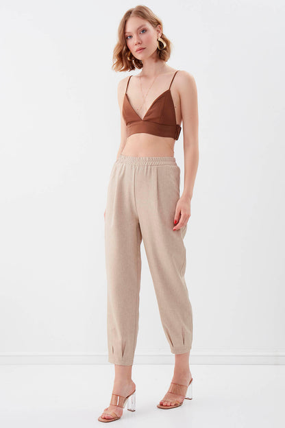 DIAMOND PLEATED HIGH-WAIST TROUSERS