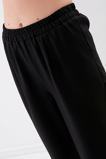 DIAMOND PLEATED HIGH-WAIST TROUSERS