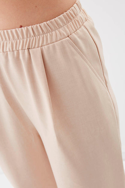 DIAMOND PLEATED HIGH-WAIST TROUSERS