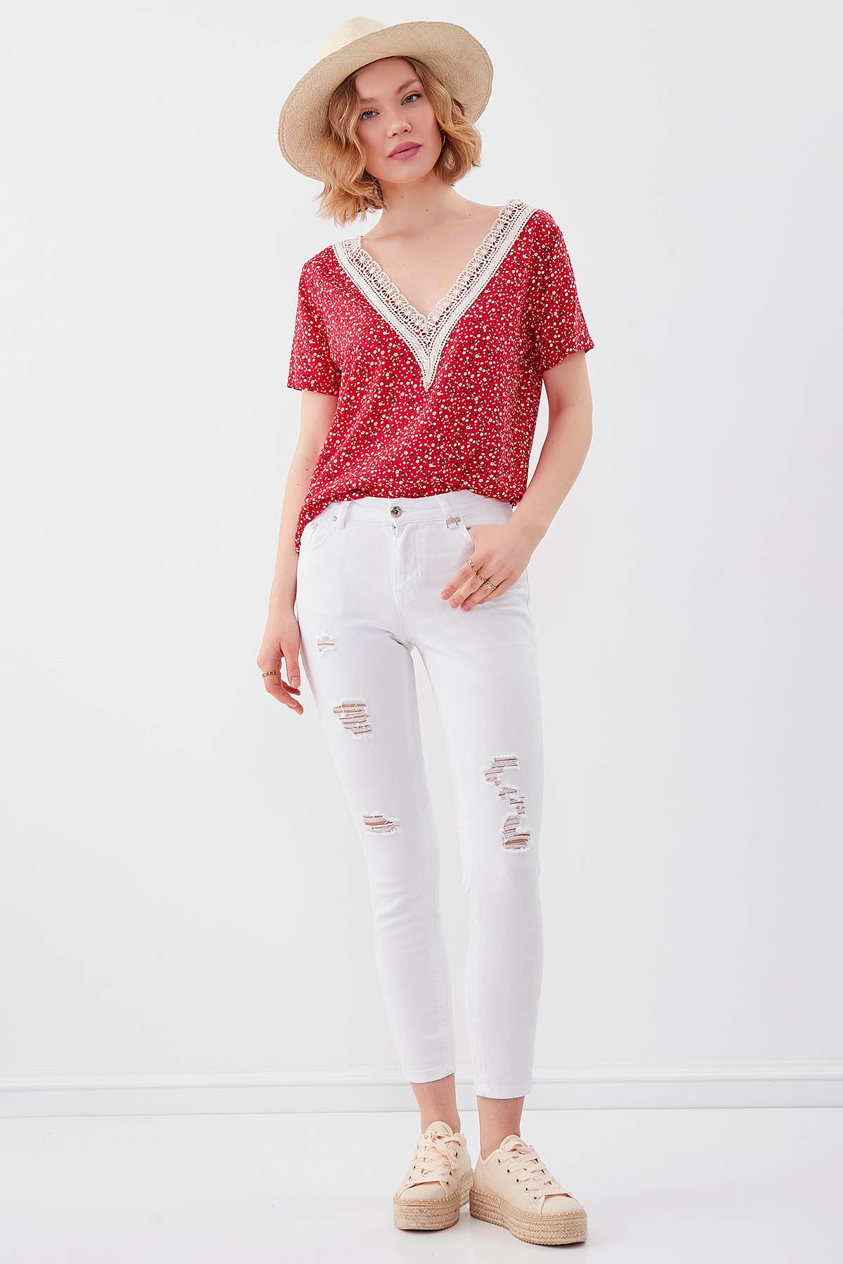 WHITE RIPPED SKINNY DENIM TROUSERS