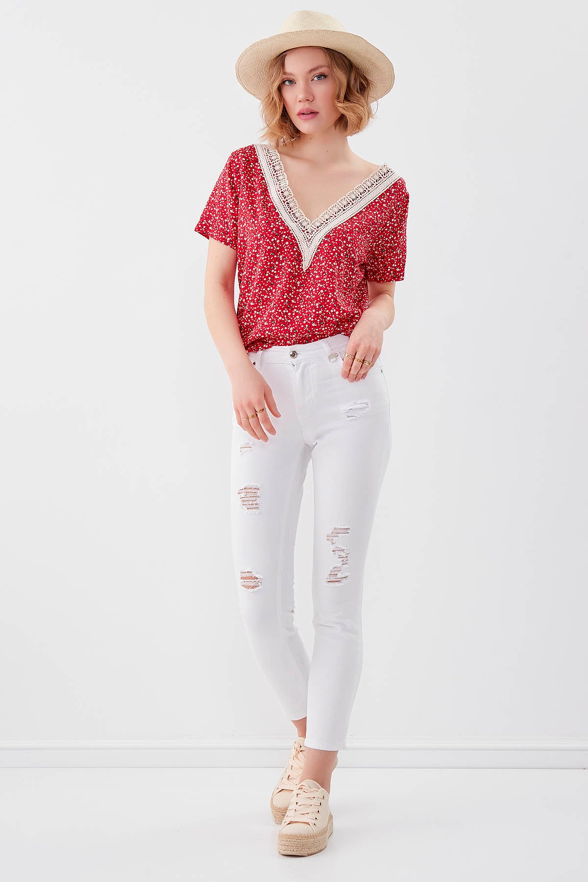 WHITE RIPPED SKINNY DENIM TROUSERS