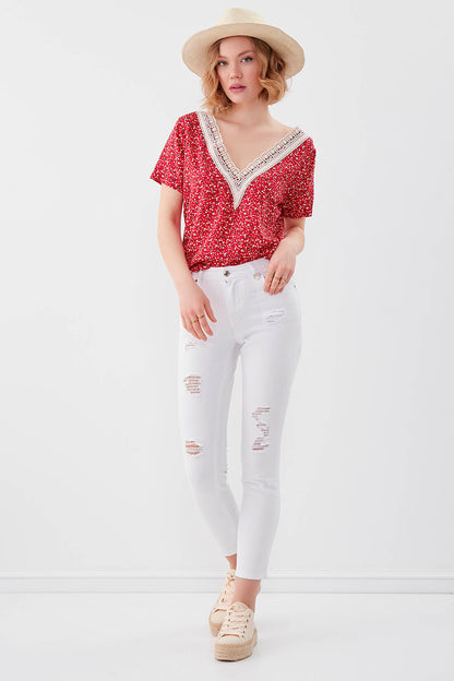 WHITE RIPPED SKINNY DENIM TROUSERS