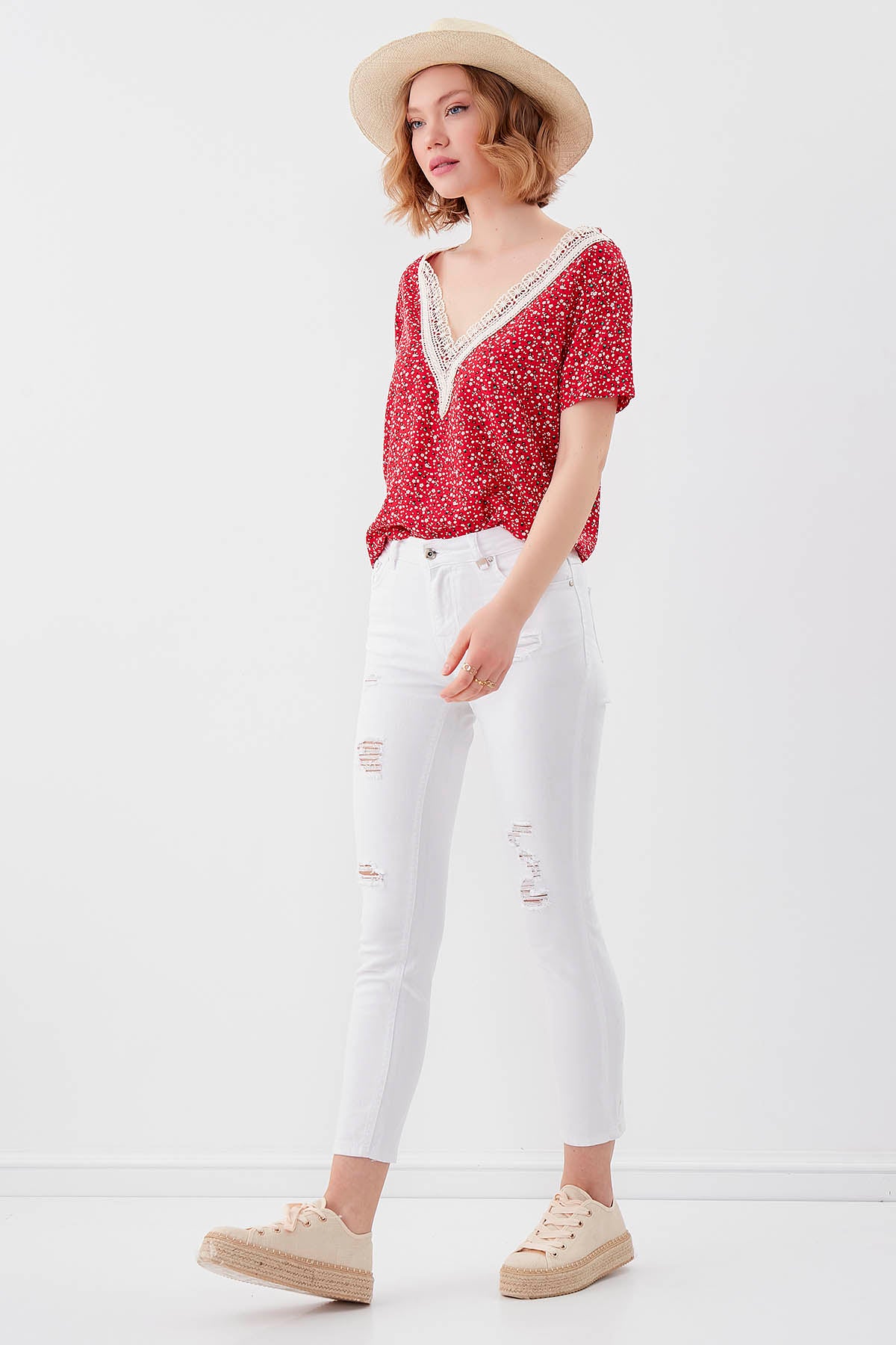 WHITE RIPPED SKINNY DENIM TROUSERS