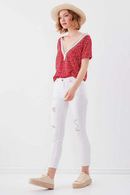 WHITE RIPPED SKINNY DENIM TROUSERS