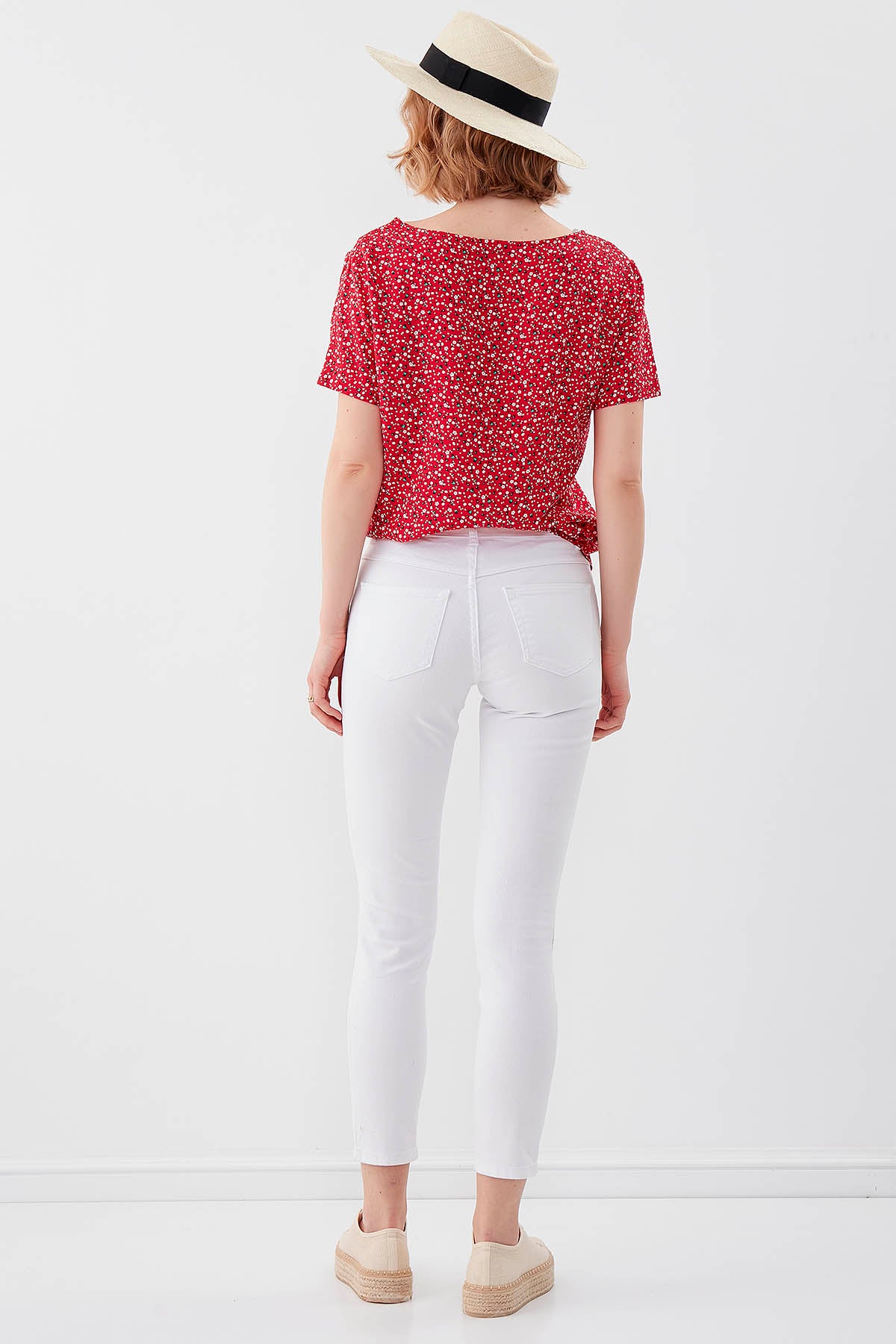 WHITE RIPPED SKINNY DENIM TROUSERS