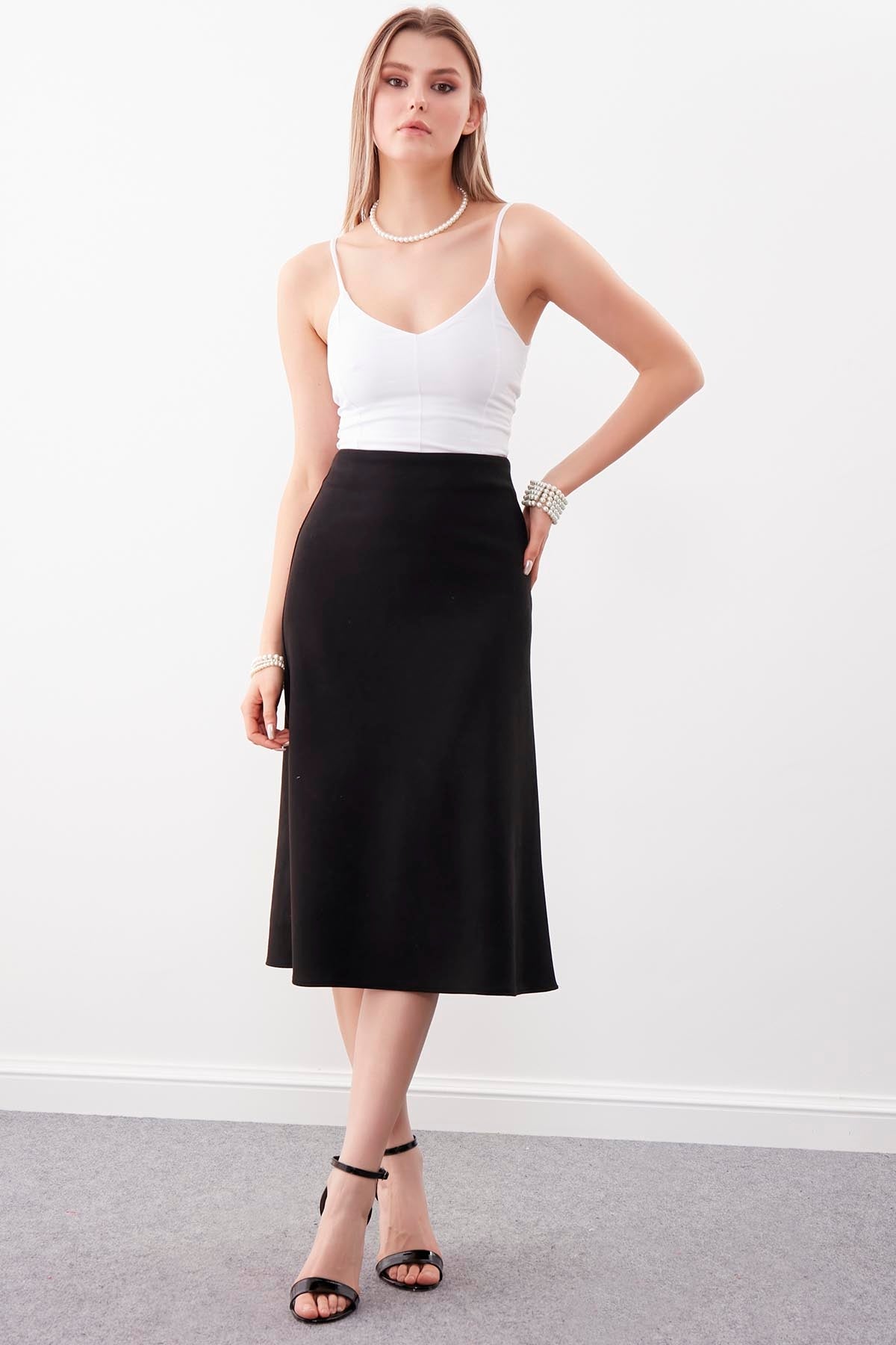 WAIST-CUTTING SUEDE CLOTH SKIRT