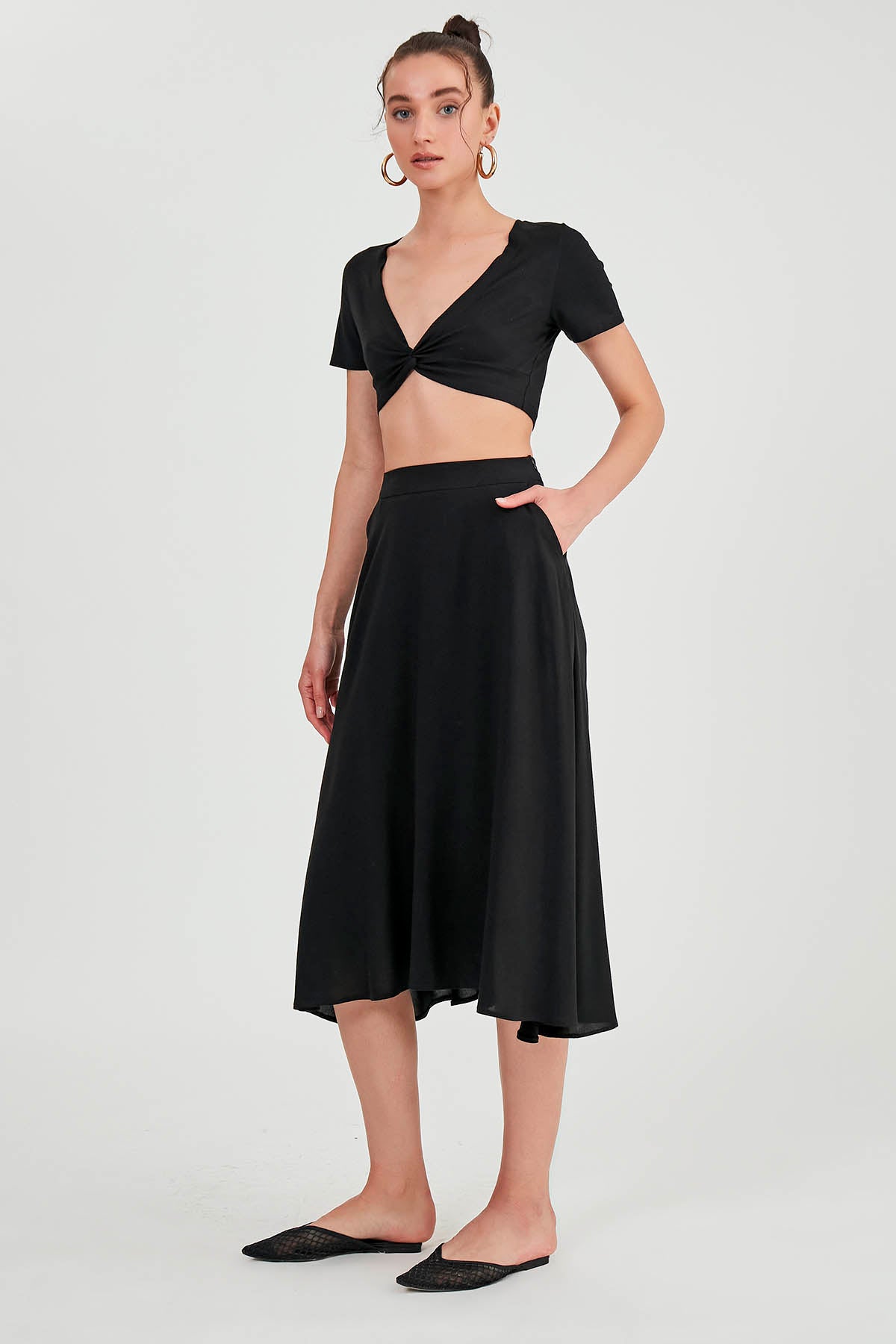POCKETED MIDI SKIRT