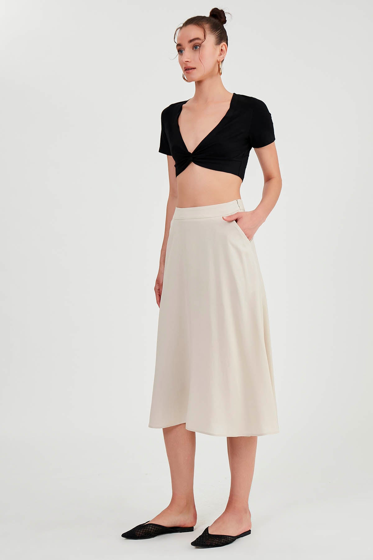 POCKETED MIDI SKIRT