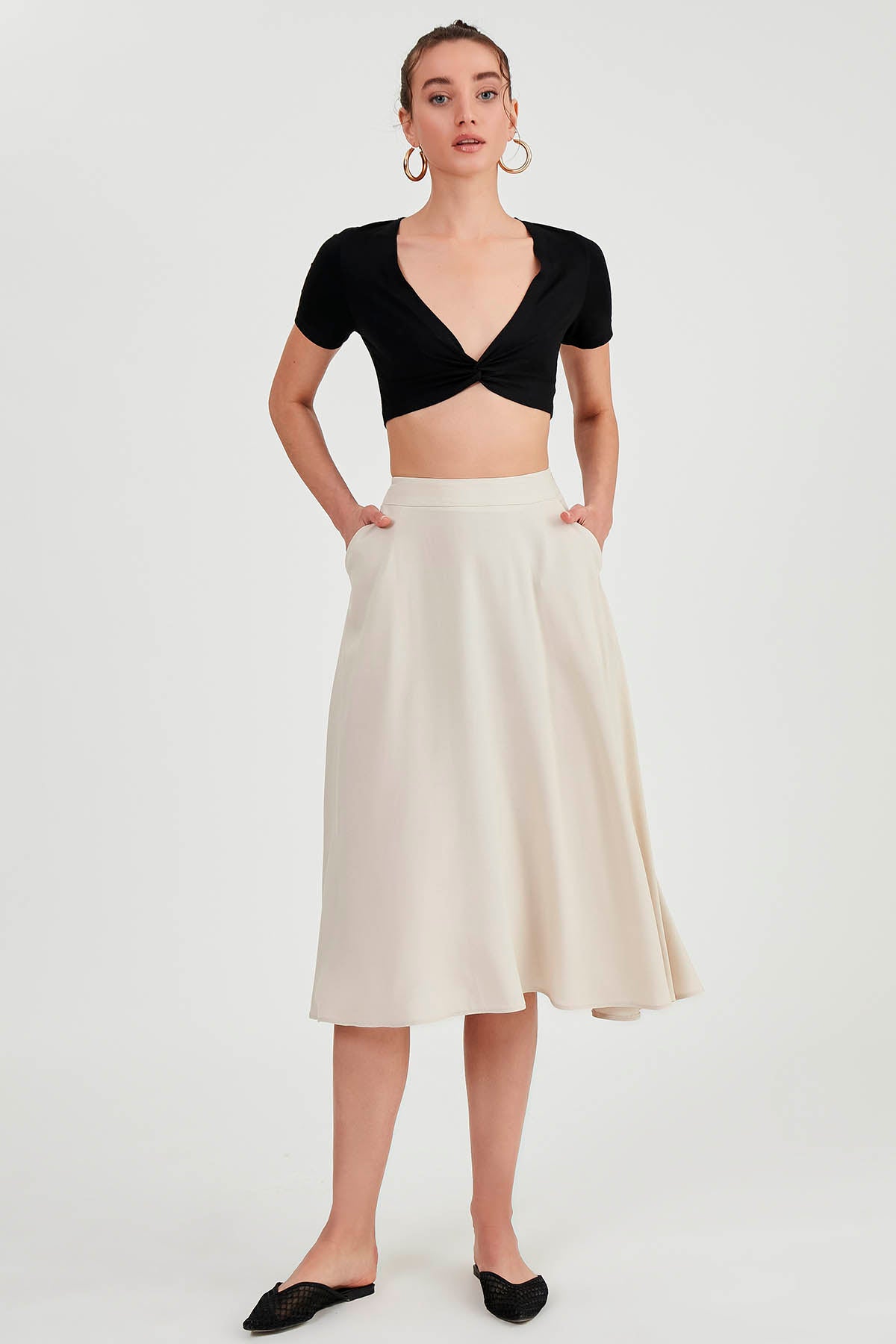 POCKETED MIDI SKIRT