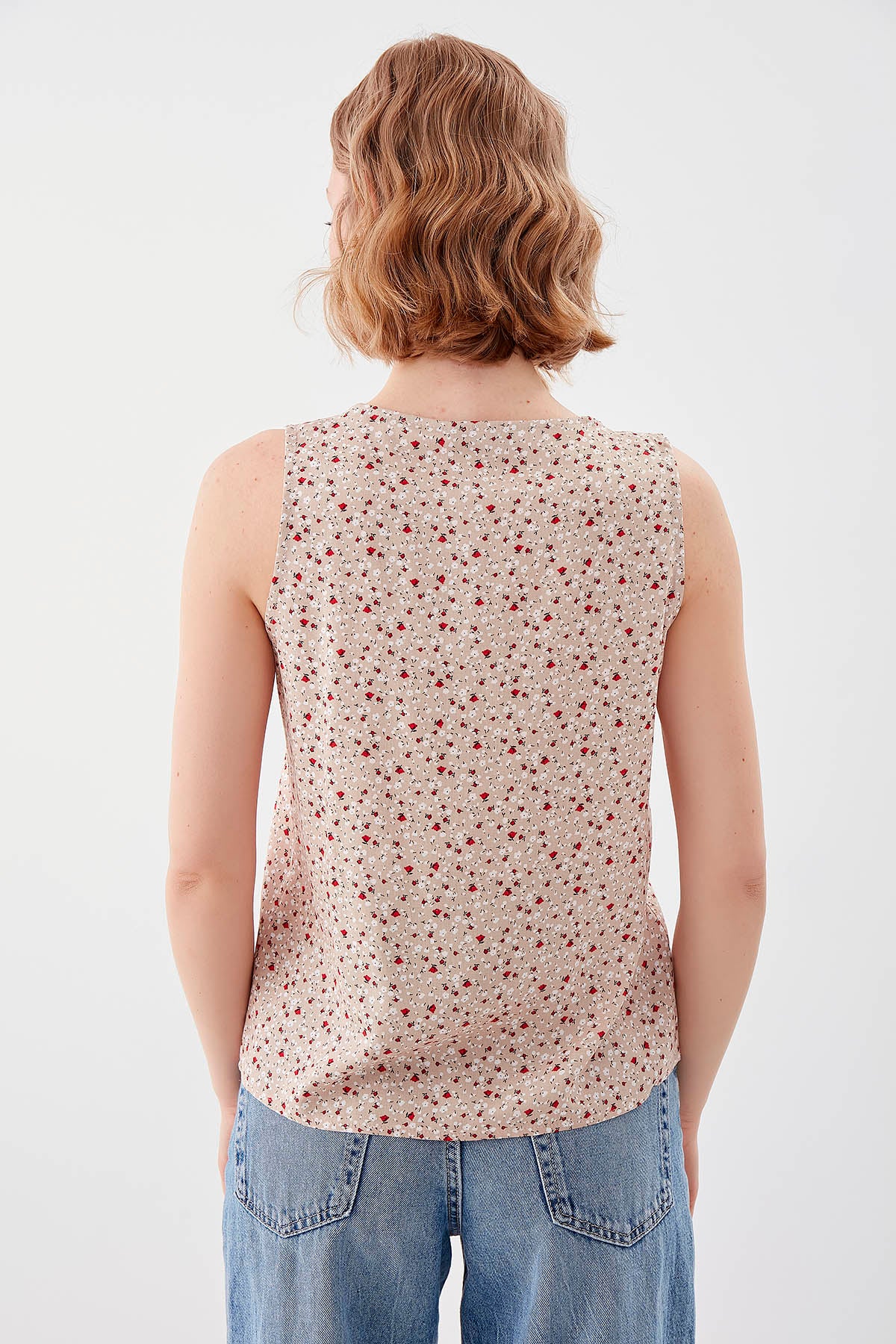FLOWER PATTERN SLEEVELESS BLOUSE