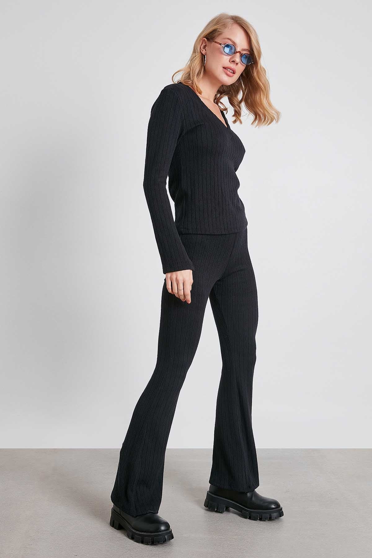 STRIPED KNITTED CLOTH COMFORTABLE TROUSERS