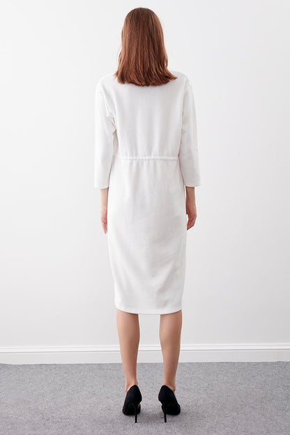 KNITTED DRESS WITH BUTTONS