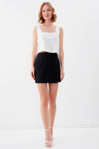 MINI-SKIRT WITH BUTTON