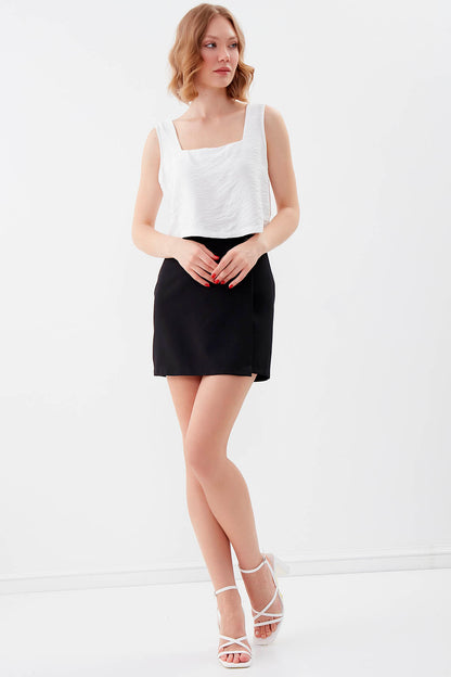 MINI-SKIRT WITH BUTTON