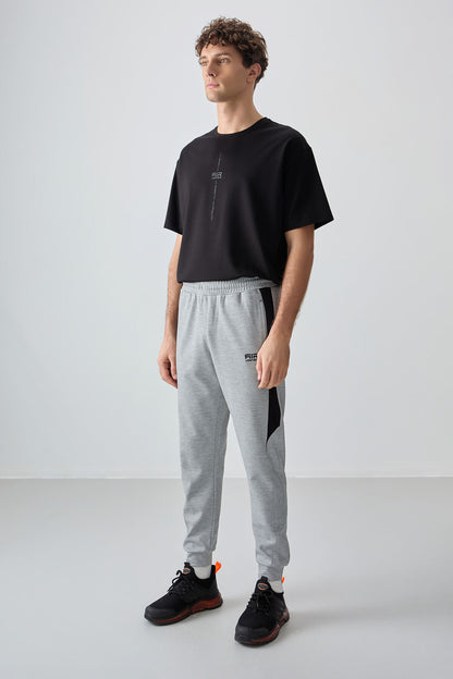 Grey Melange Textured Surface Standard Fit Embroidered Men's Tracksuit Bottom - 82126