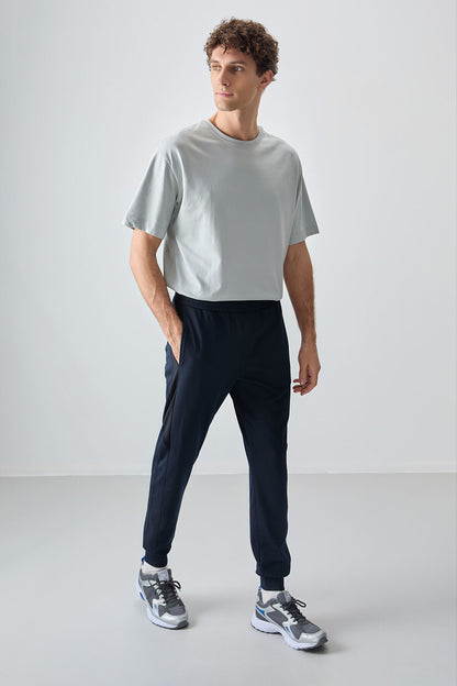 Navy Blue Textured Surface Standard Fit Embroidered Men's Tracksuit Bottom - 82126