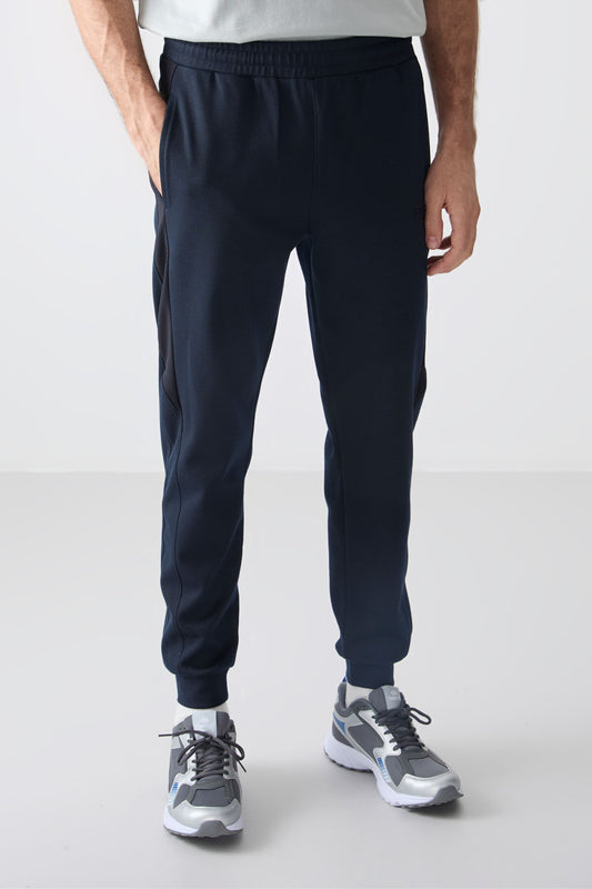 Navy Blue Textured Surface Standard Fit Embroidered Men's Tracksuit Bottom - 82126