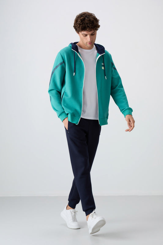 Tracksuit with a sea-green, indigo cotton fabric