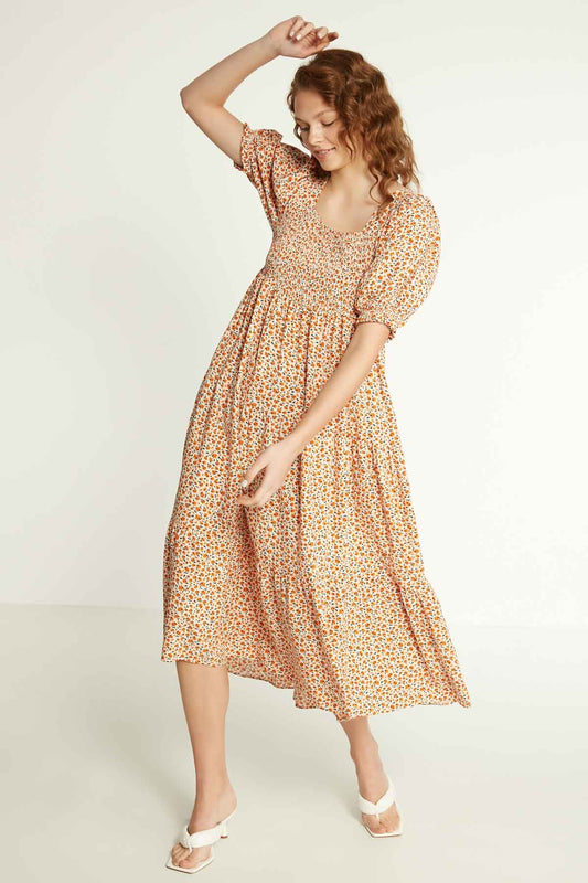 LONG DRESS WITH COILED SLEEVES AND FLORAL PATTERN