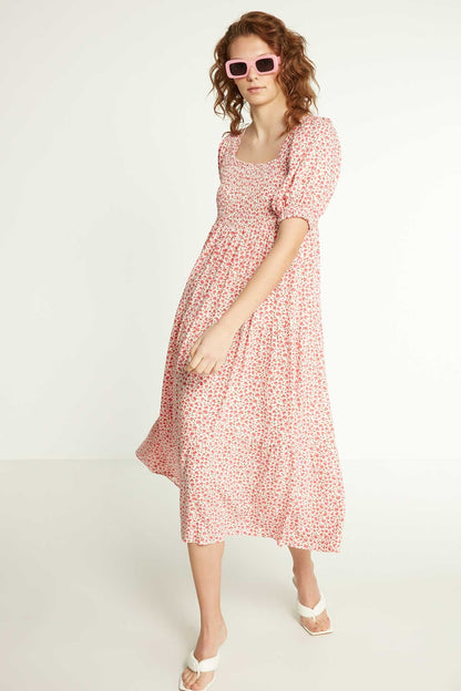 LONG DRESS WITH COILED SLEEVES AND FLORAL PATTERN