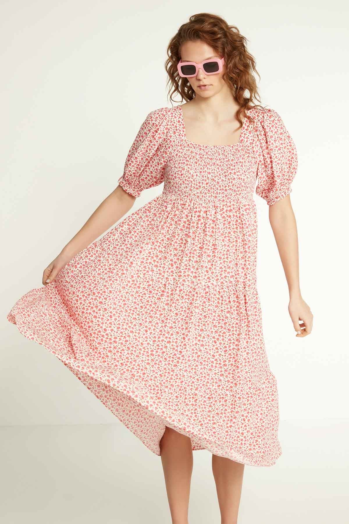 LONG DRESS WITH COILED SLEEVES AND FLORAL PATTERN