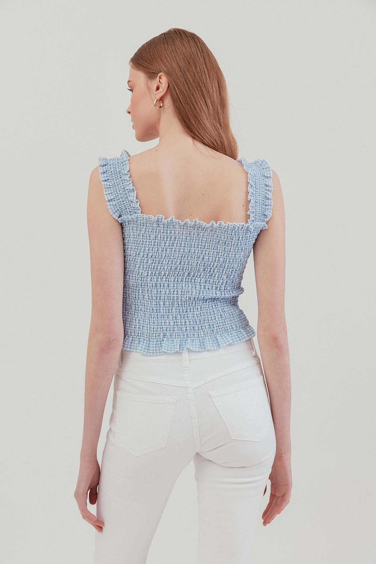 COILED BOLD MINI BLOUSE