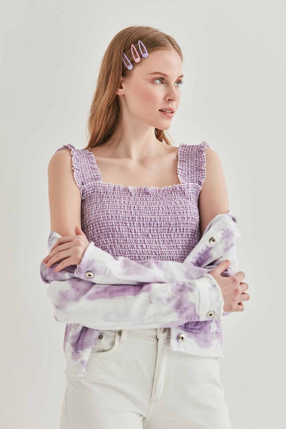 COILED BOLD MINI BLOUSE