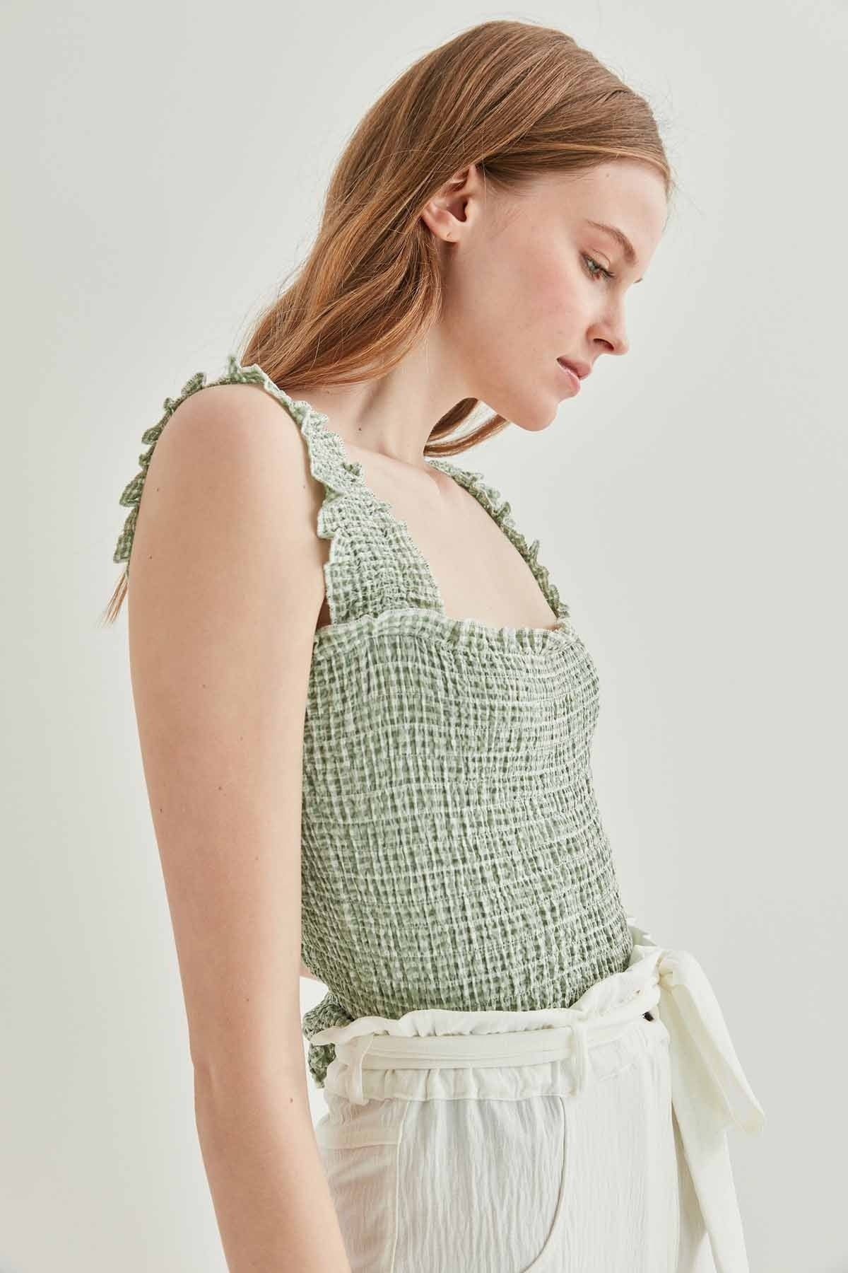 COILED BOLD MINI BLOUSE