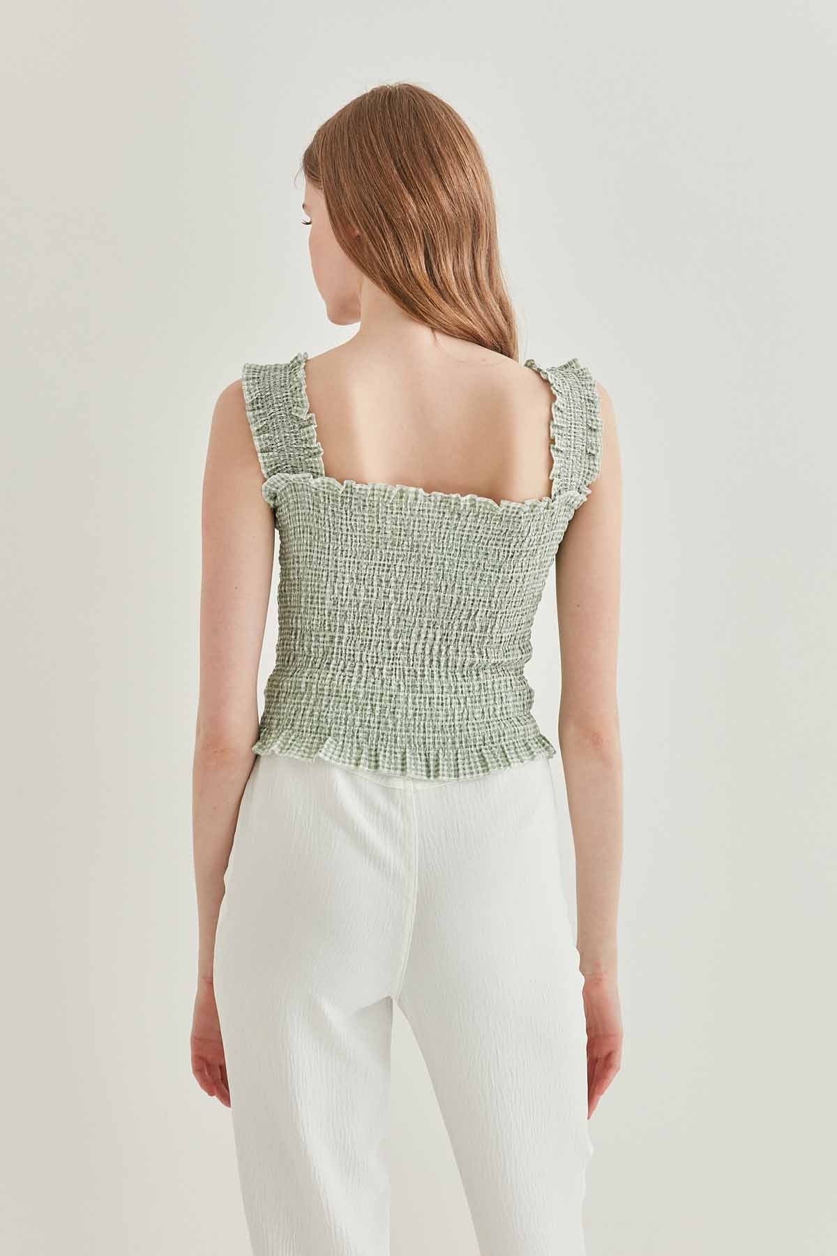 COILED BOLD MINI BLOUSE