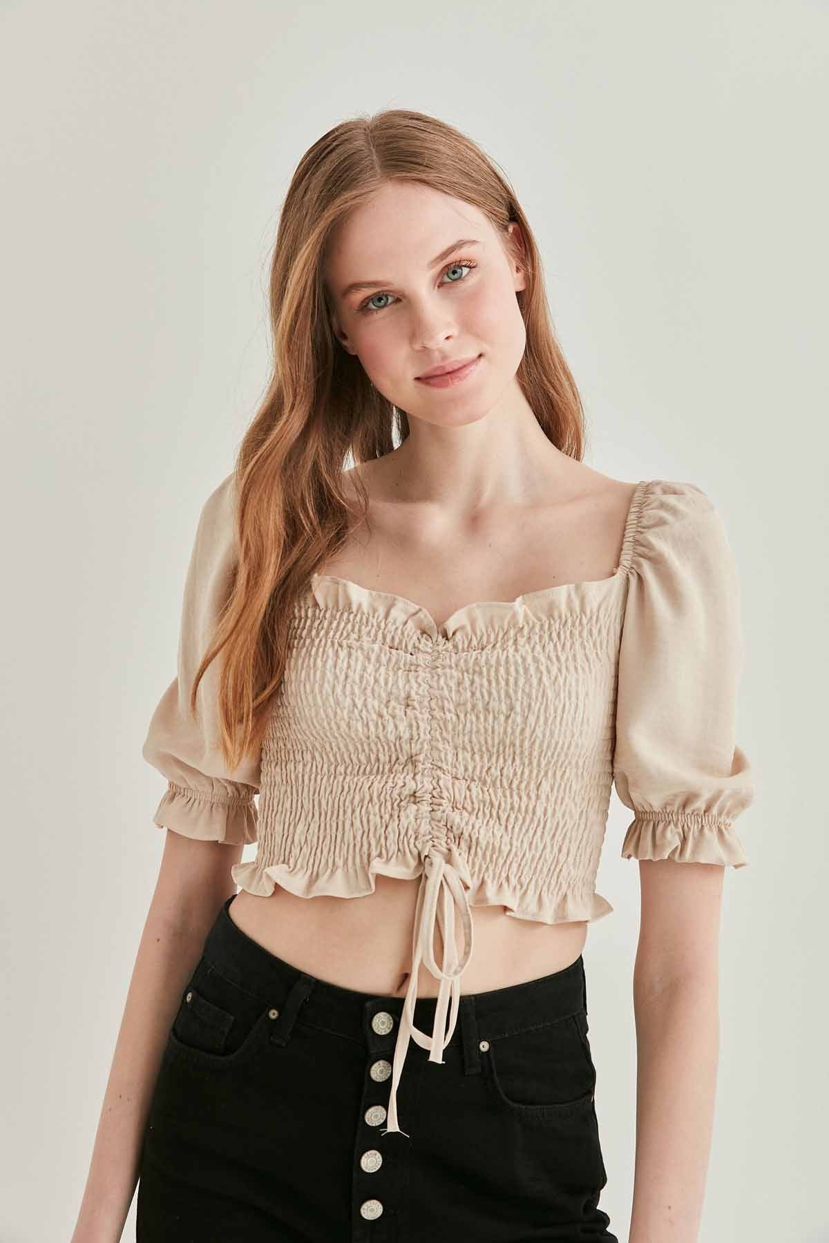 COILED FRONT DRAWSTRING TROJAN SLEEVE BLOUSE