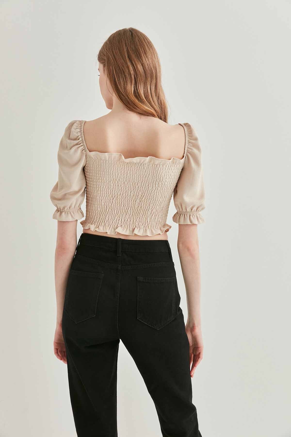 COILED FRONT DRAWSTRING TROJAN SLEEVE BLOUSE
