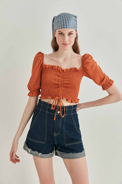 COILED FRONT DRAWSTRING TROJAN SLEEVE BLOUSE