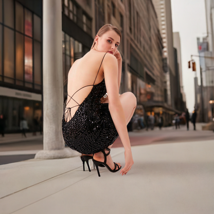 BACK-DECKLED SEQUINED DRESS