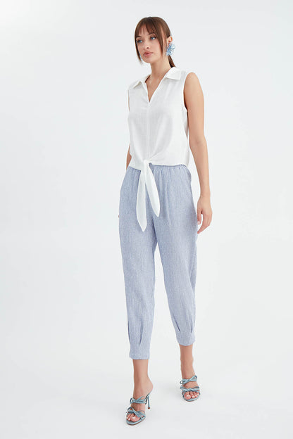 THIN LINE PLEATED CROP TROUSERS