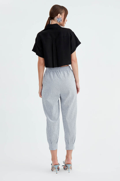 THIN LINE PLEATED CROP TROUSERS