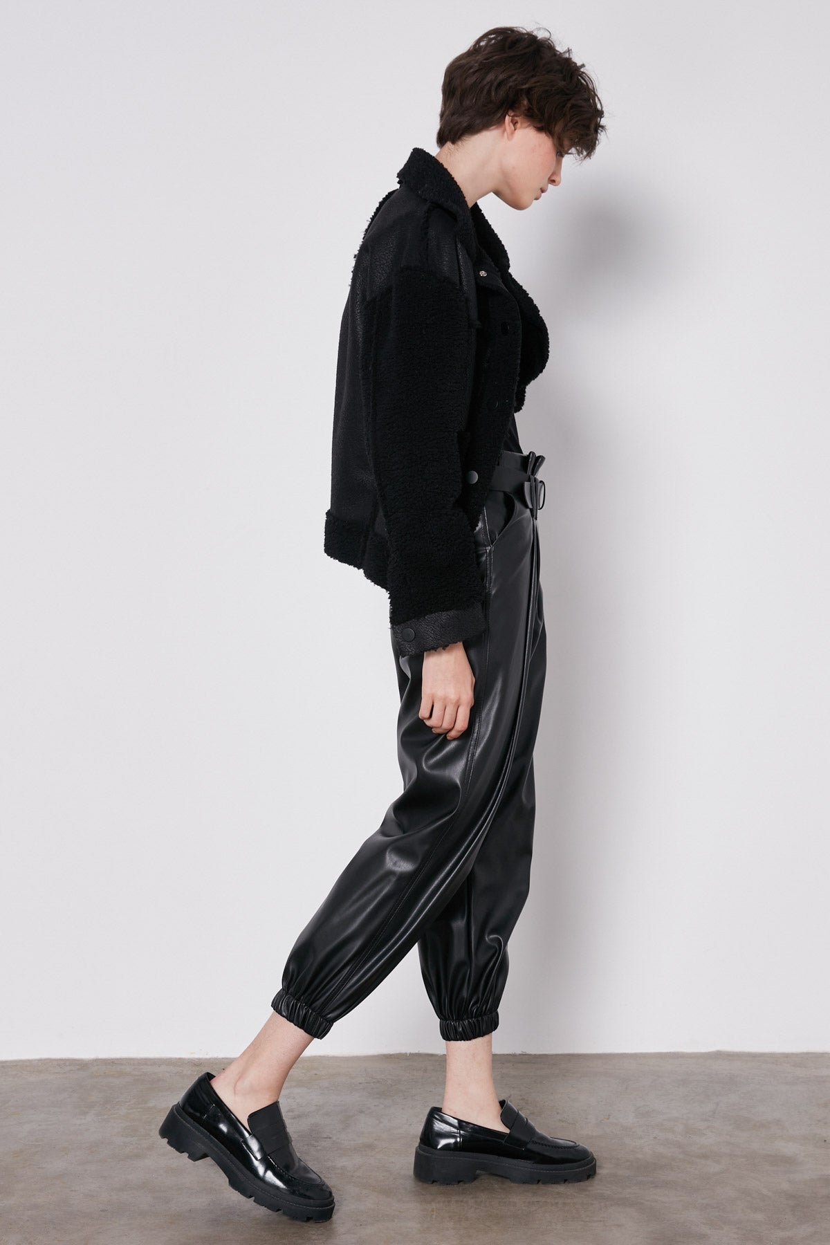 ARCHED BELT TRACK ELASTANE WAIST FAUX LEATHER TROUSERS
