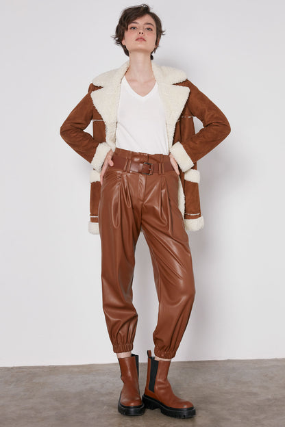 ARCHED BELT TRACK ELASTANE WAIST FAUX LEATHER TROUSERS