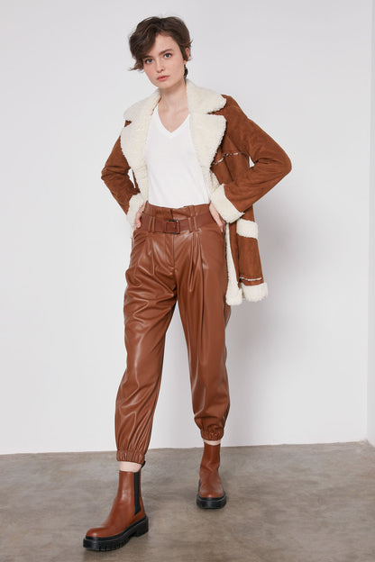 ARCHED BELT TRACK ELASTANE WAIST FAUX LEATHER TROUSERS