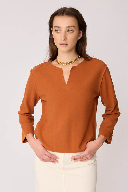 CUT V-COLLAR REVERSE-STITCH BLOUSE