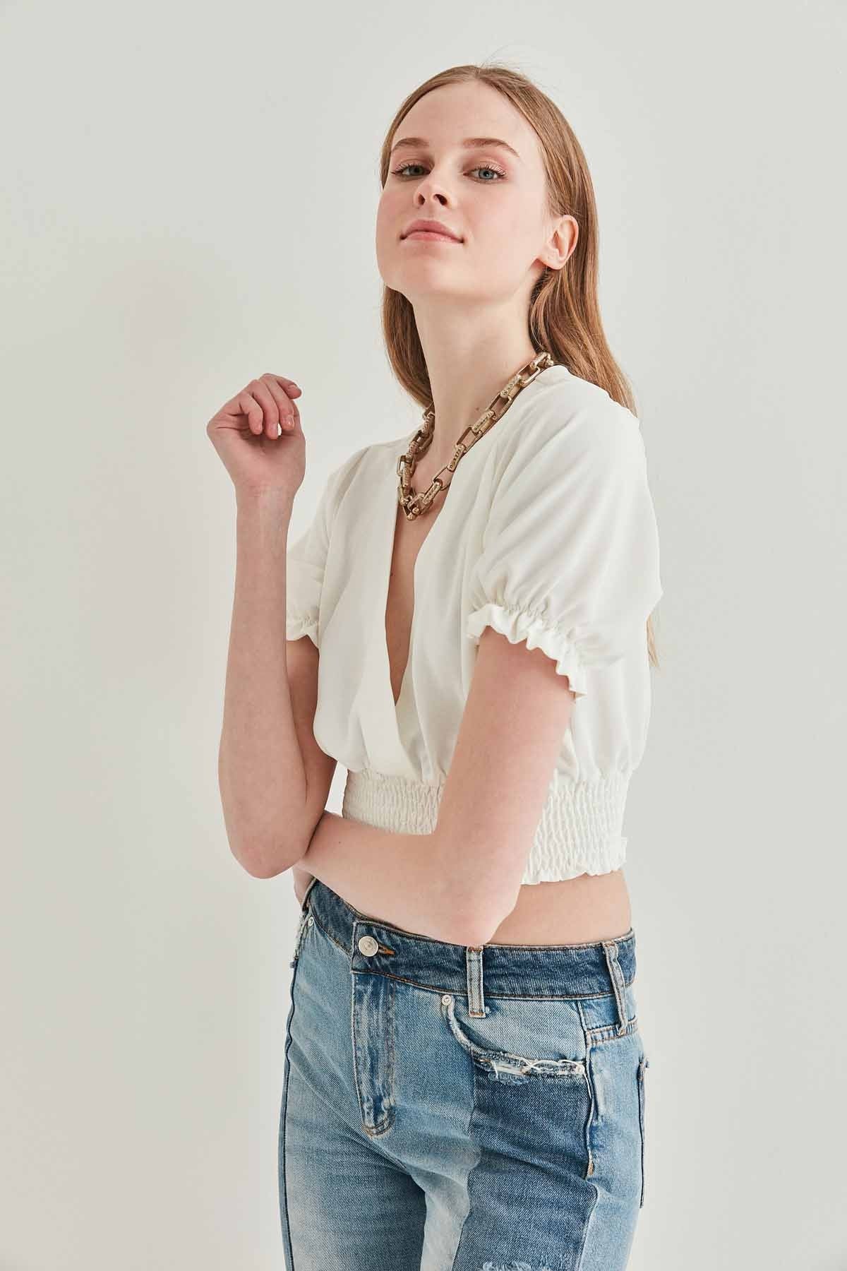 COILED BLOUSE
