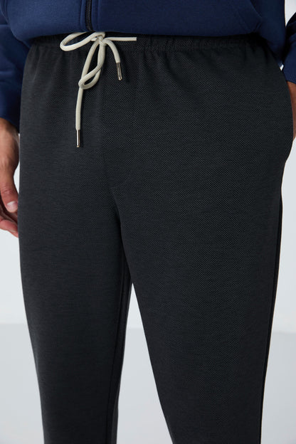 Dark Grey Textured Surface Standard Fit Men's Tracksuit Bottom- 82154