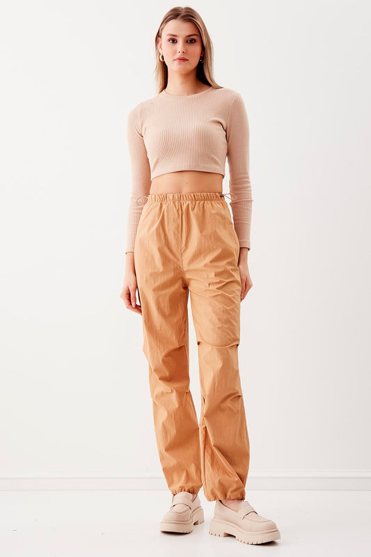 RUBBER-DETAILED PARACHUTE FABRIC TROUSERS