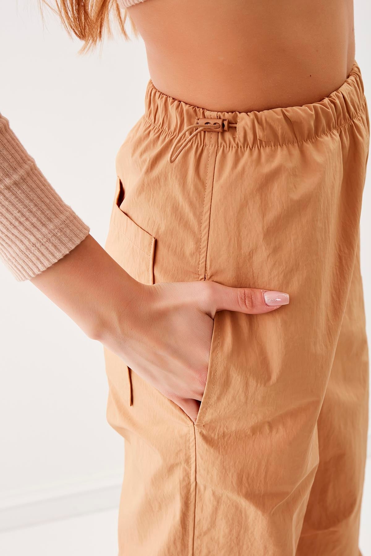 RUBBER-DETAILED PARACHUTE FABRIC TROUSERS