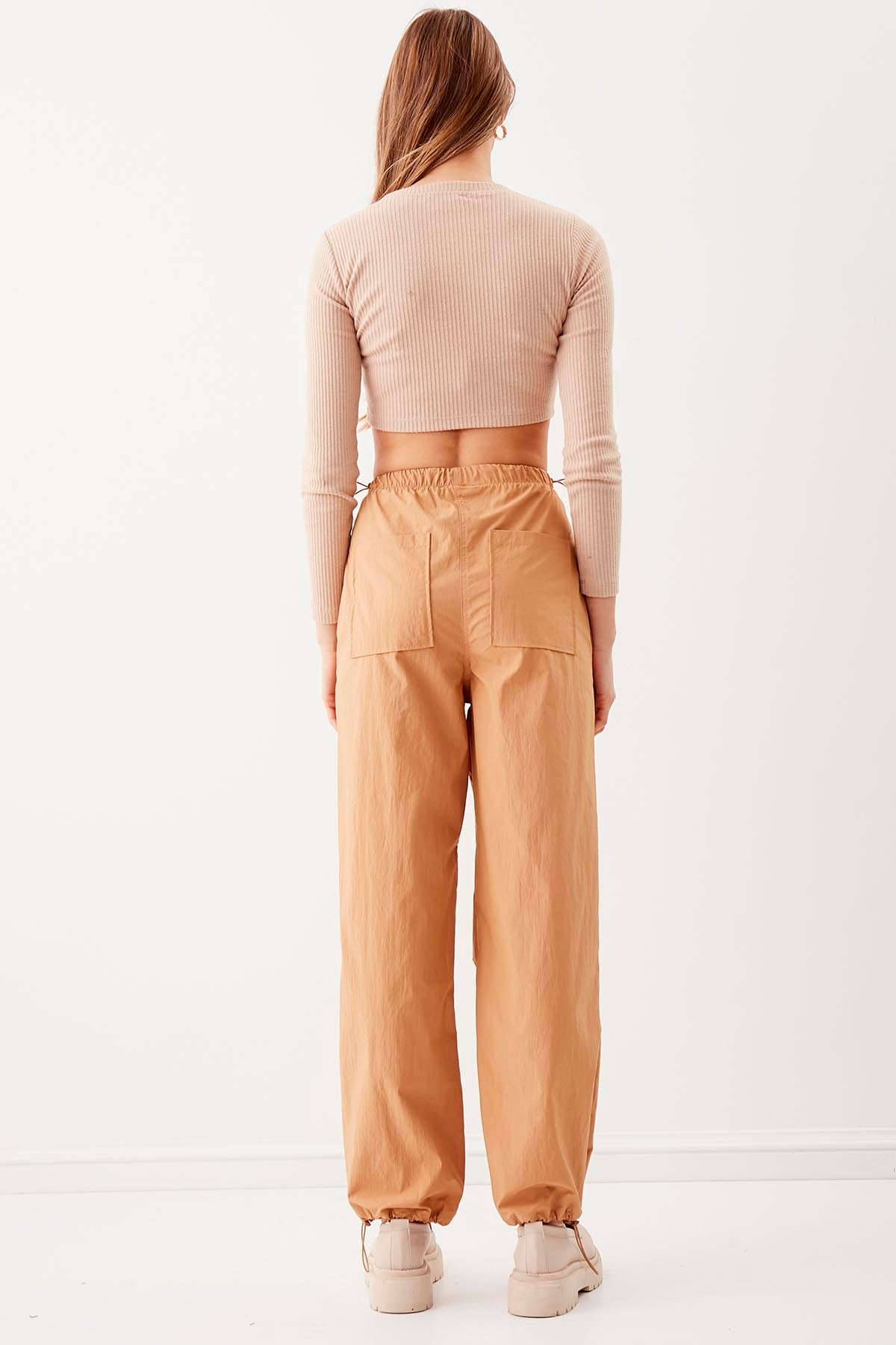RUBBER-DETAILED PARACHUTE FABRIC TROUSERS