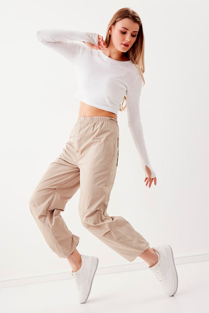 RUBBER-DETAILED PARACHUTE FABRIC TROUSERS